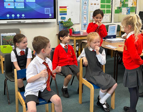 Black History Month - Y2 children re-enacting Rosa Parks' famous bus protest